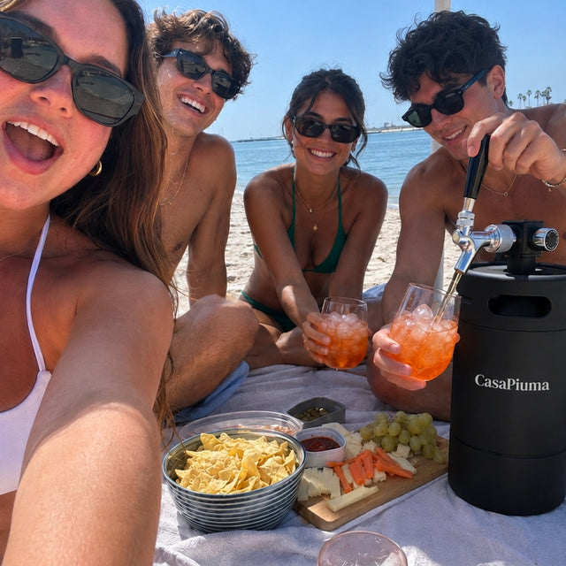 Spillatore CasaPiuma in spiaggia con gli amici